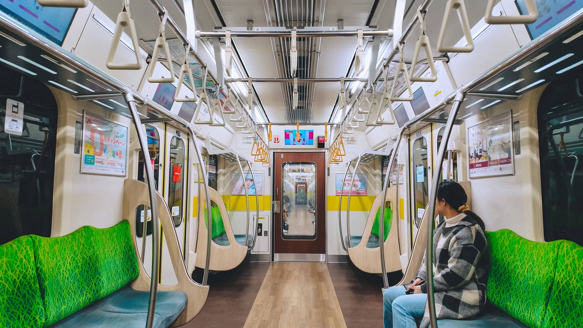 Empty Tokyo Metro at night.