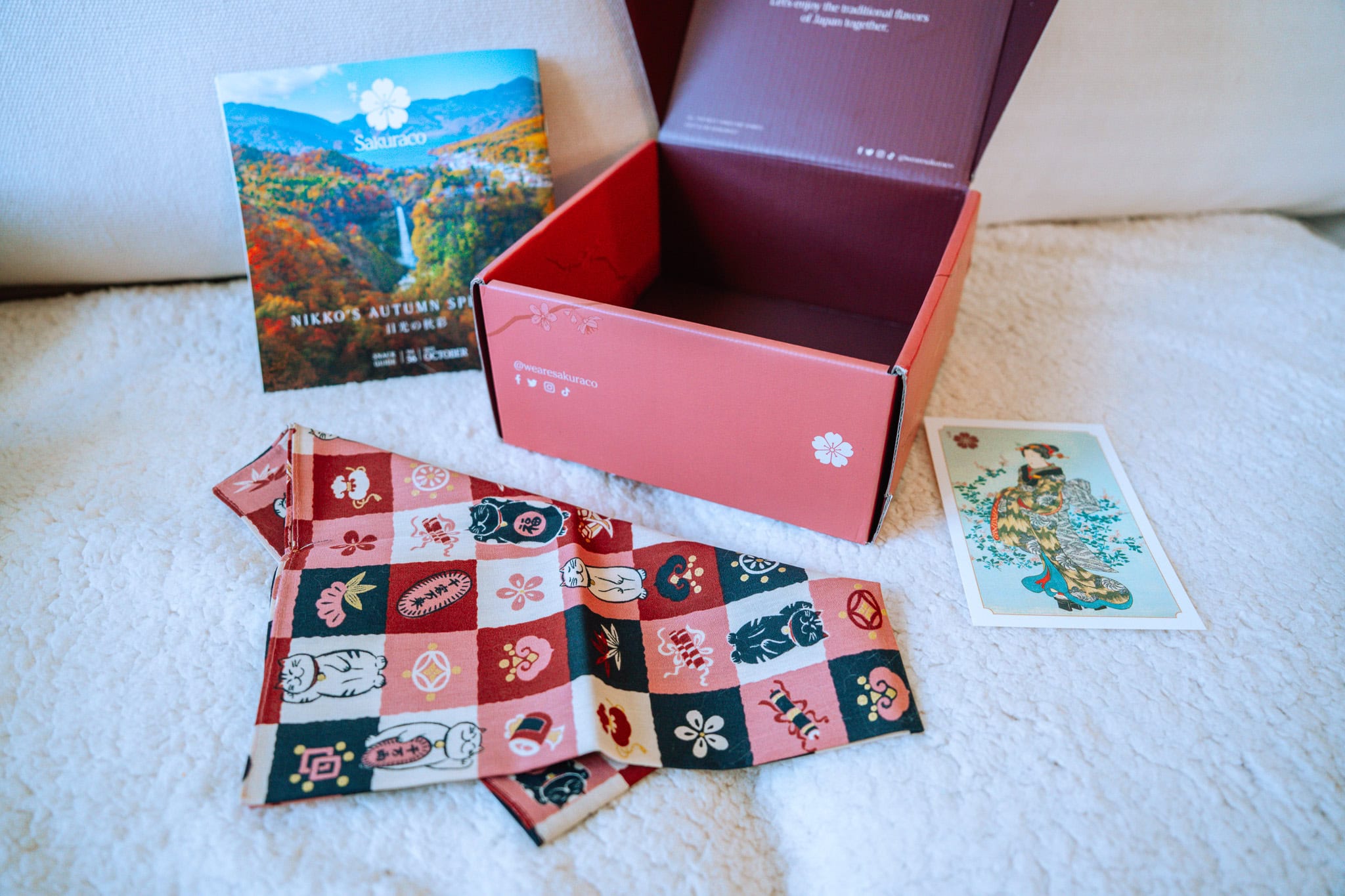 Sakuraco Japan snack box with home goods.